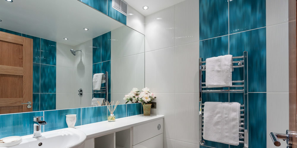 The bathroom setup and installation. Bath and shower setup, heating, plumbing, tiling, glass and furniture installs, painting, decoration and finish.